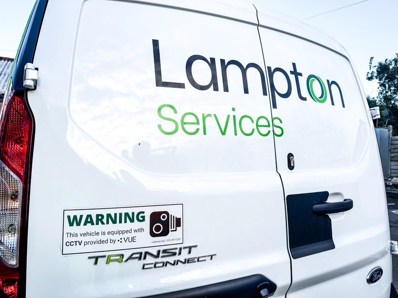 Lampton Fleet Vehicle that is advertising Lampton Services